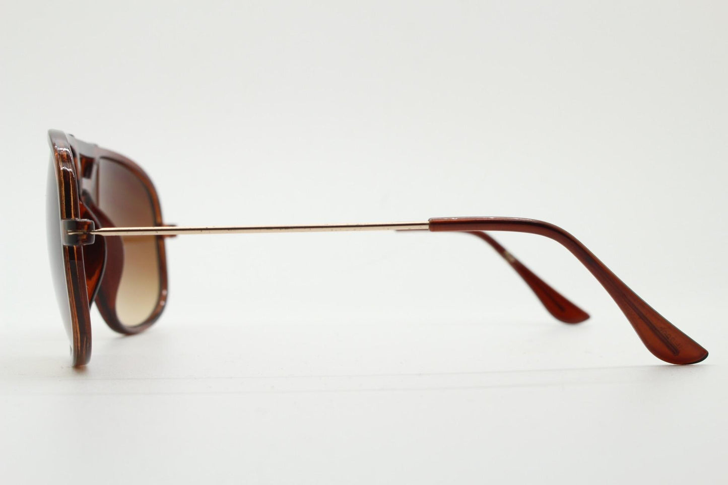 Y2K vintage square aviator sunglasses. 2000's transparent brown frame with graduating lenses and gold arms. 70s design. 00's NOS aviators