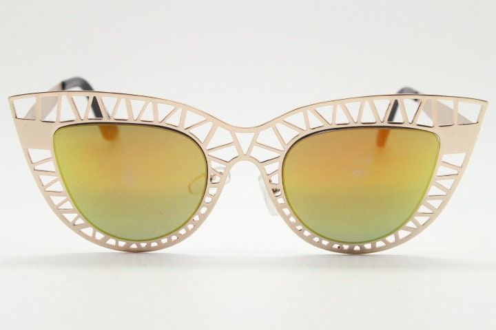 Y2K vintage metal cat eye sunglasses. Women's extraordinary gold cut out lattice scaffold cateye frame with gold mirror lenses. 2000s. BNWT