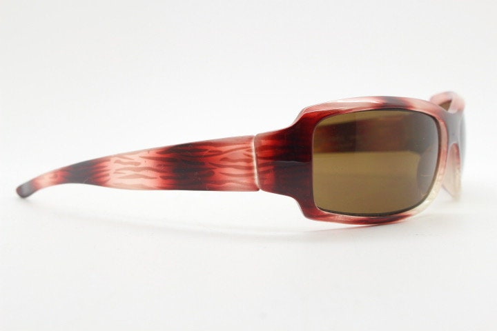 Vintage rectangular shield sunglasses. Transparent abstract red tiger print low profile visor style wrap around frame. Y2K NOS. 2000s
