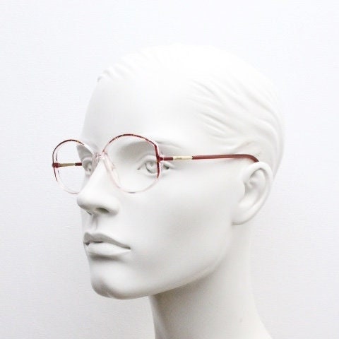 Silhouette 80s vintage hexagon eye glasses made in Austria. Transparent crystal optical frame with abstract red pattern. Prescription RX