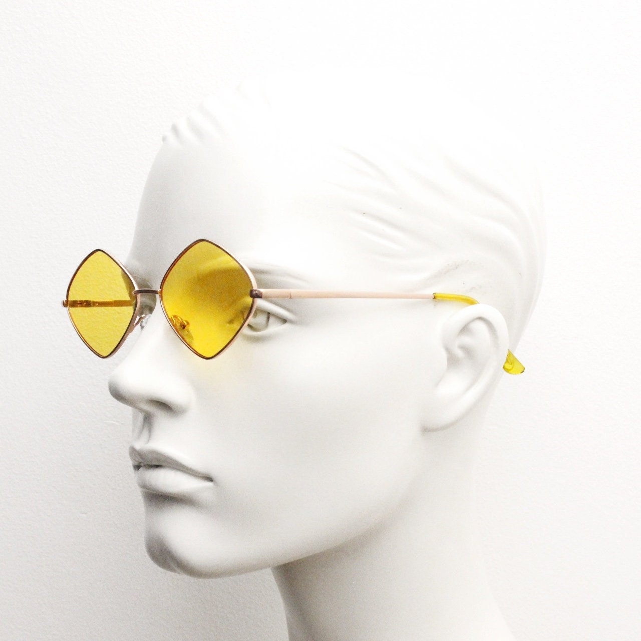 90s vintage diamond sunglasses. Minimal rose gold frame with psychedelic mod style yellow lenses. Unused BNWT