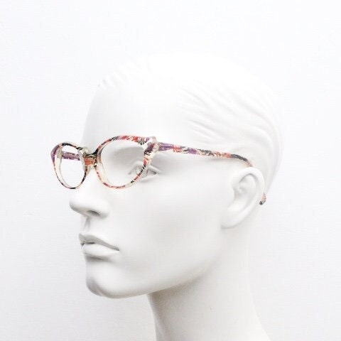 Alain Mikli Paris cat eye glasses made in France. Radical redefinition of the cateye optical frame. Womens prescription eyeglasses. RX