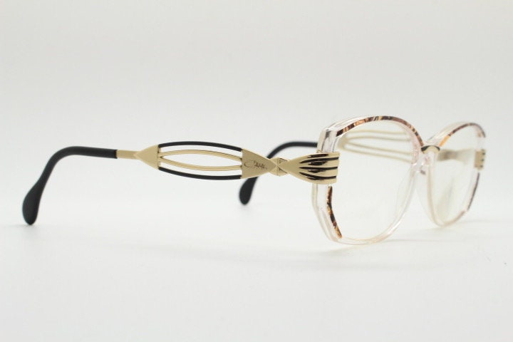 Cazal 90s vintage angular eye glasses made in Germany. Low profile crystal optical frames with detailed arms. Prescription eyeglasses. RX