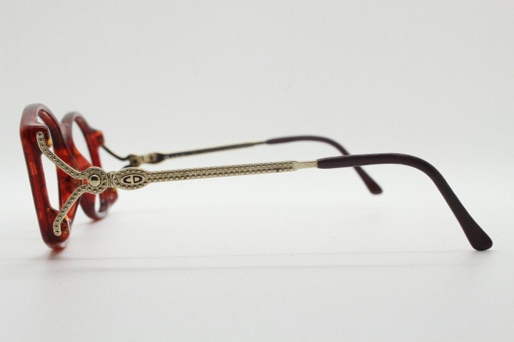 Christian Dior 80s vintage rectangular eye glasses made in Germany from Optyl. Striking marbled amber acetate optical frame. Prescription RX