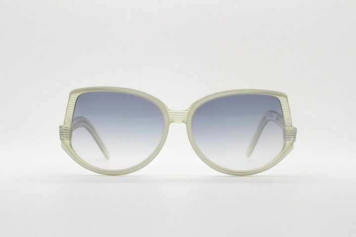 Silhouette 70s vintage abstract upside down sunglasses model 3018 made in Austria. Dynamic grey pearlised acetate frame with white stripes