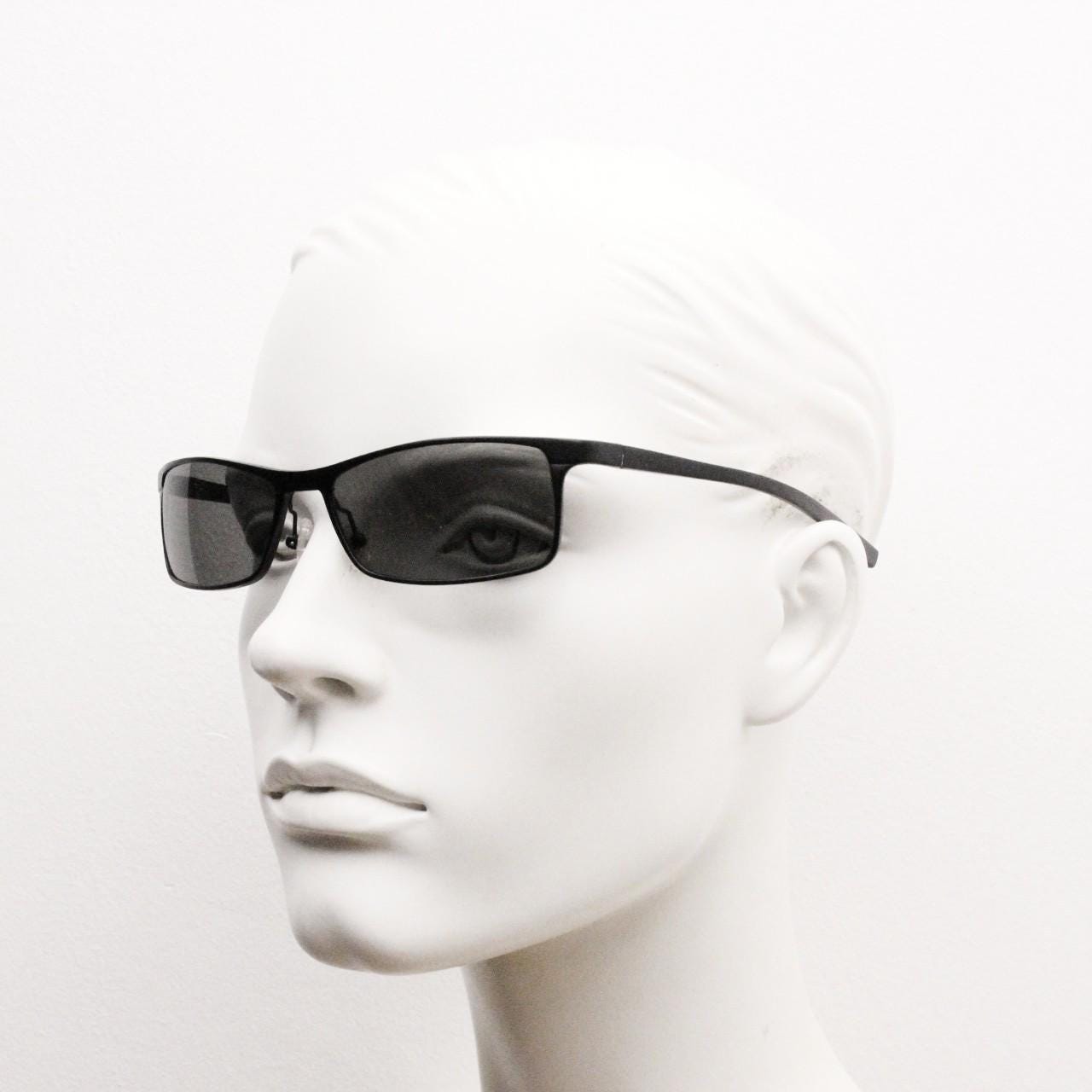 90s vintage sharp rectangular sunglasses by Storm. Minimal matt finish low profile flat top with straightened arms. 60s design. NOS
