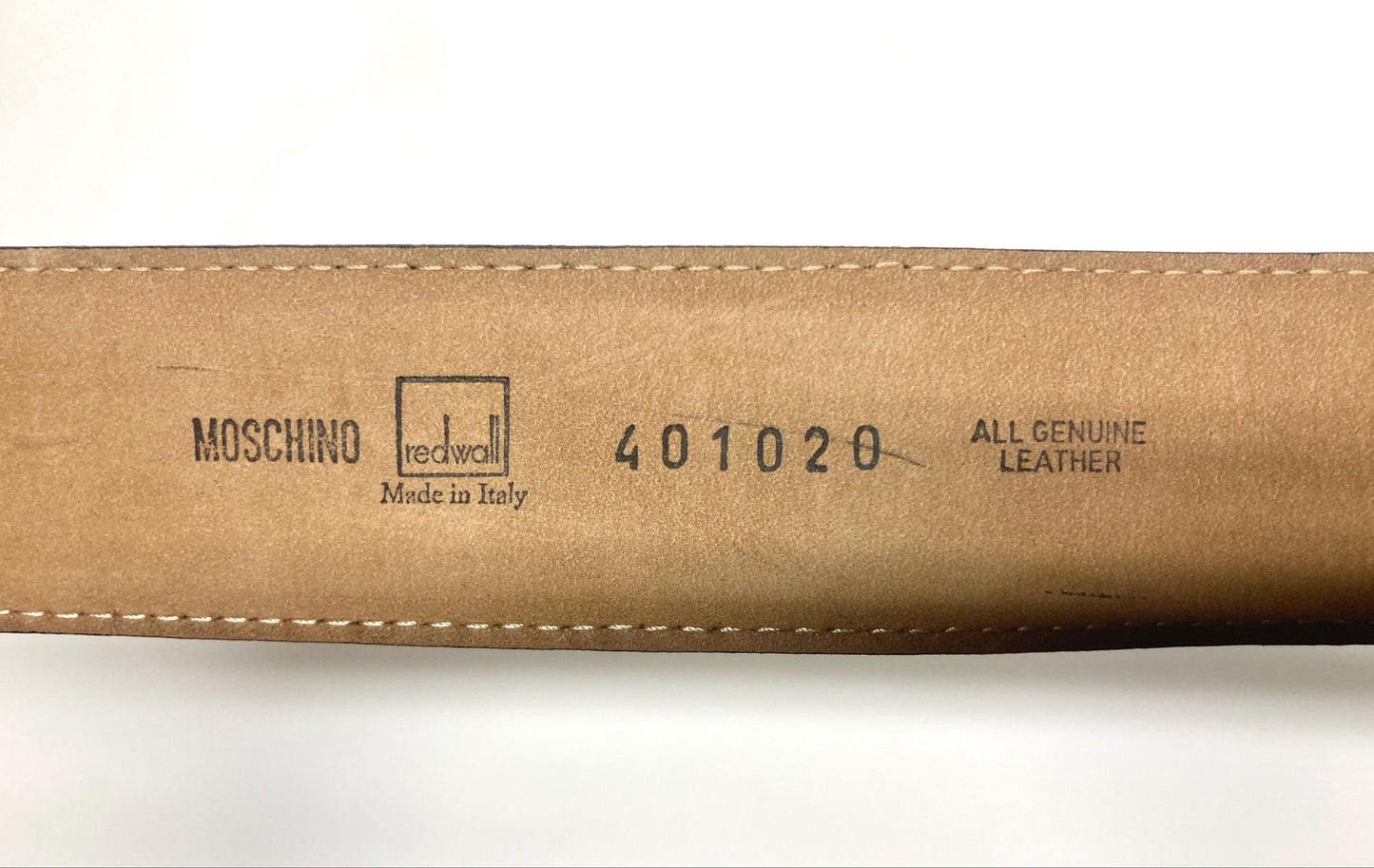 Moschino 90s vintage womens dress belt in black genuine leather. Iconic individual golden moving letters logo. Made in Italy. 80s. NOS