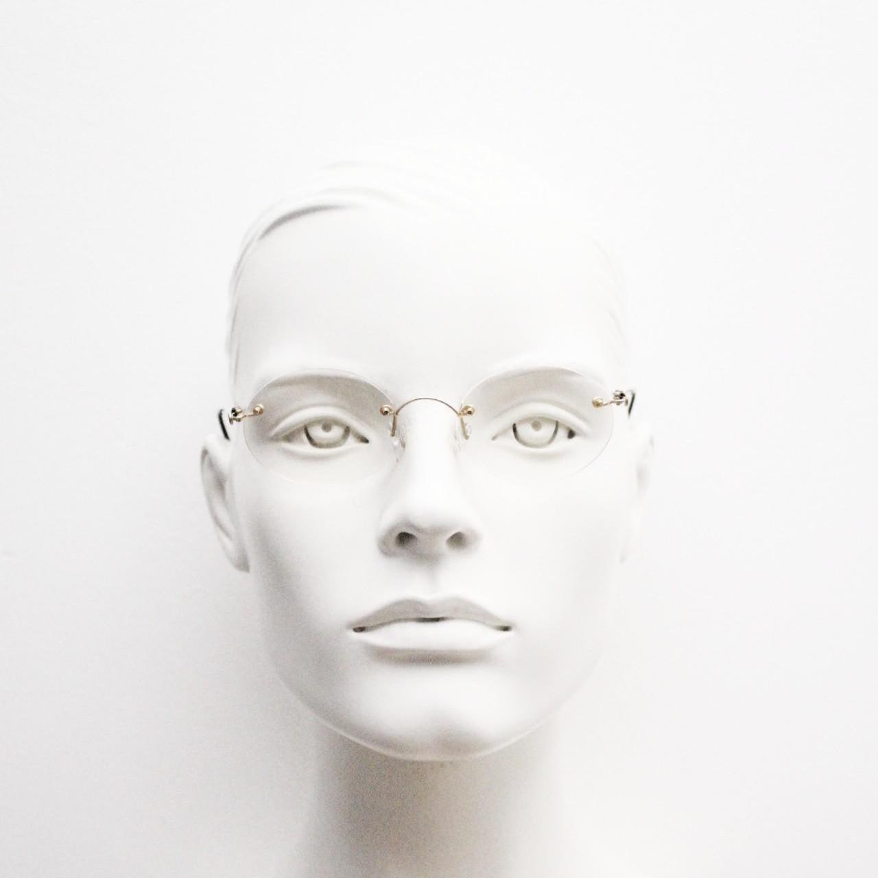 TRY vintage oval frameless eye glasses made in Italy. Futuristic minimal lightweight gold titanium optical frame. RX Spectacles