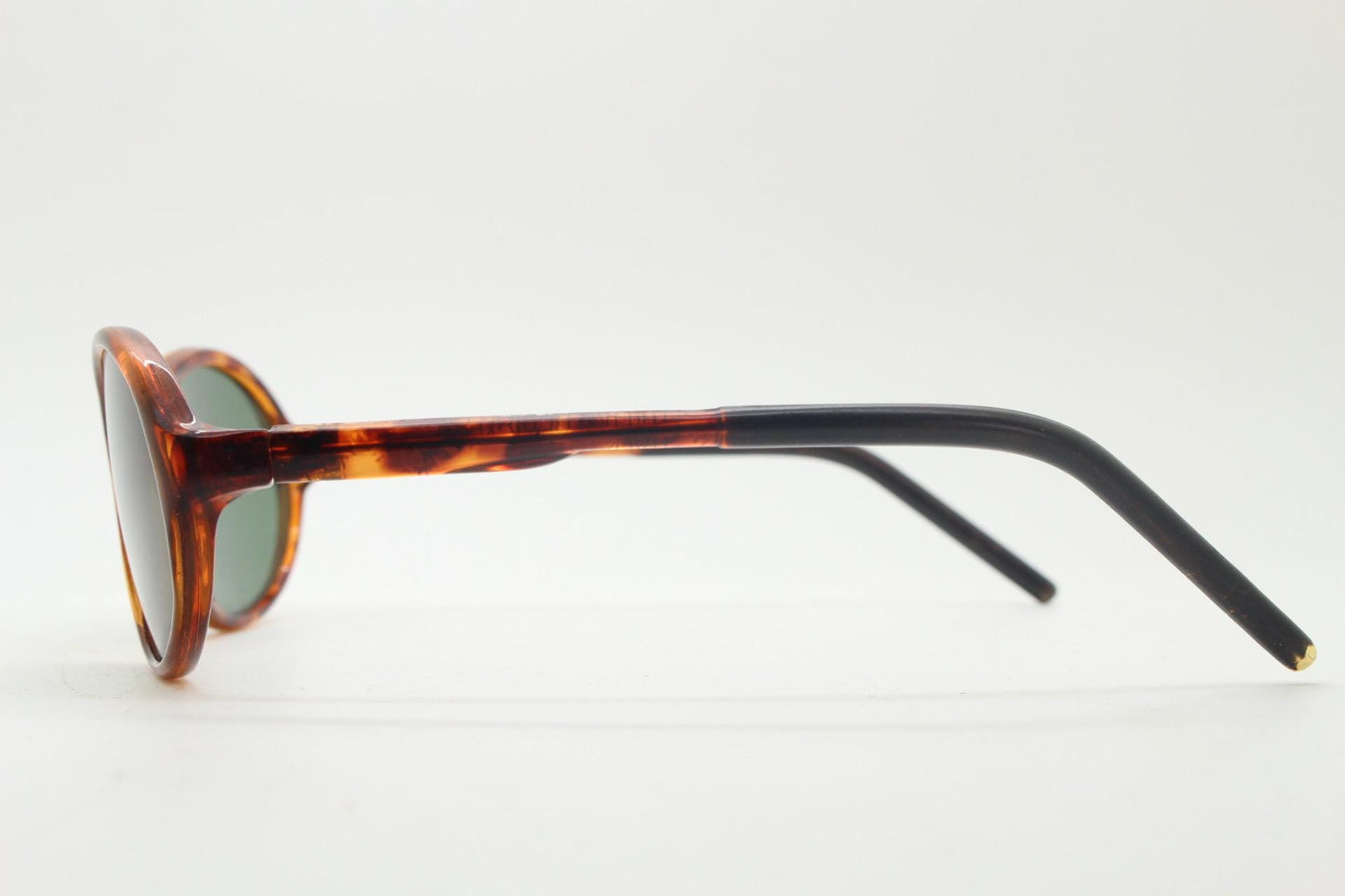 90s vintage oval small bug eye sunglasses. Tortoise gloss frame with quality real green glass lenses