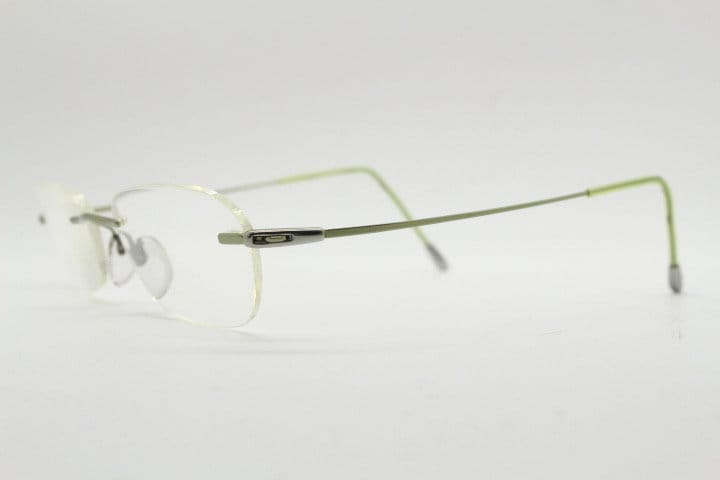 Silhouette rectangular frameless eye glasses made in Austria. Minimal lightweight optical frame with silver trim. Prescription RX