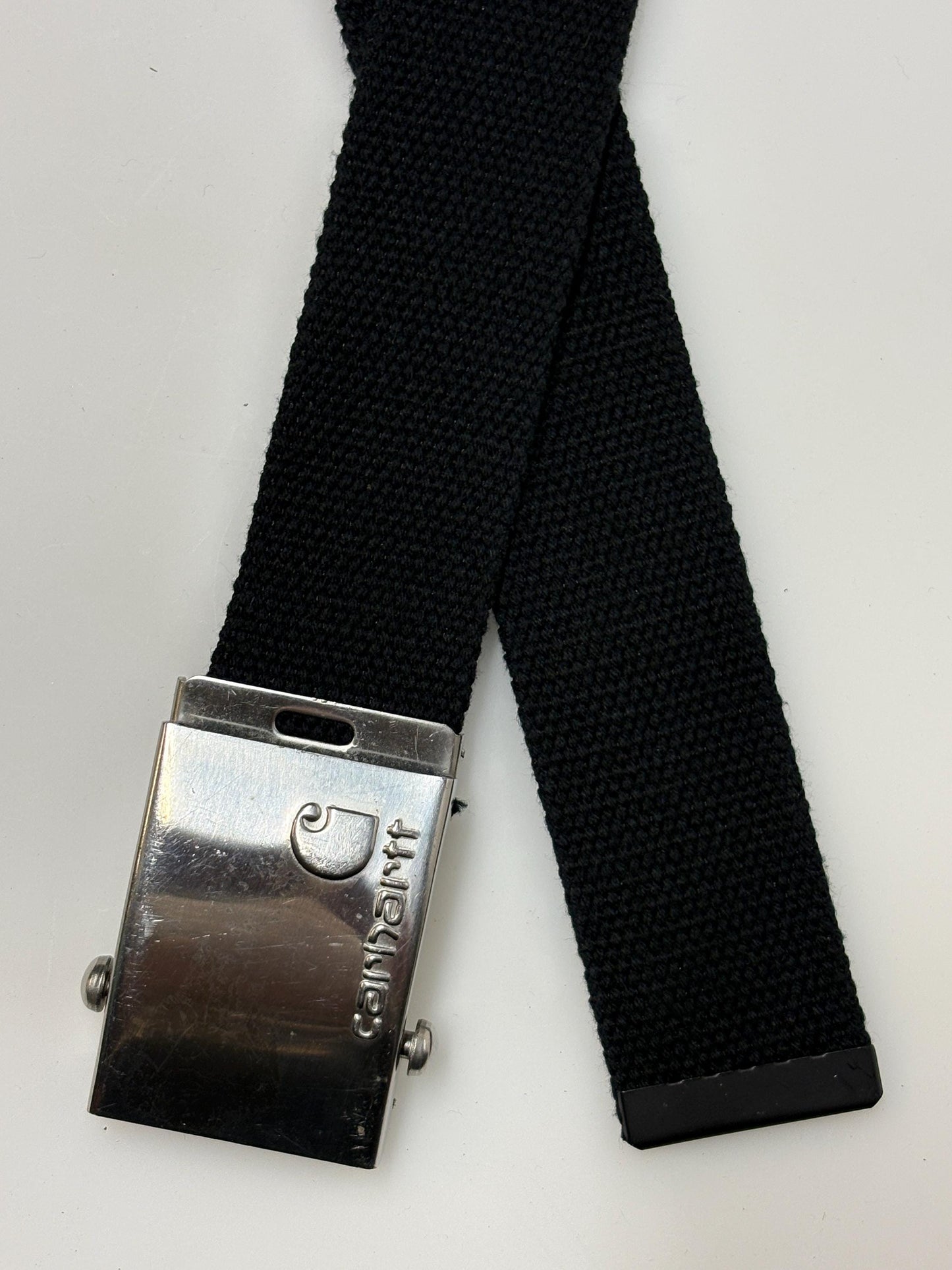 Carharrt vintage canvas army style belt buckle with 2 belts . One black plus one khaki green. no holes format. Slide lock . Fully adjustable