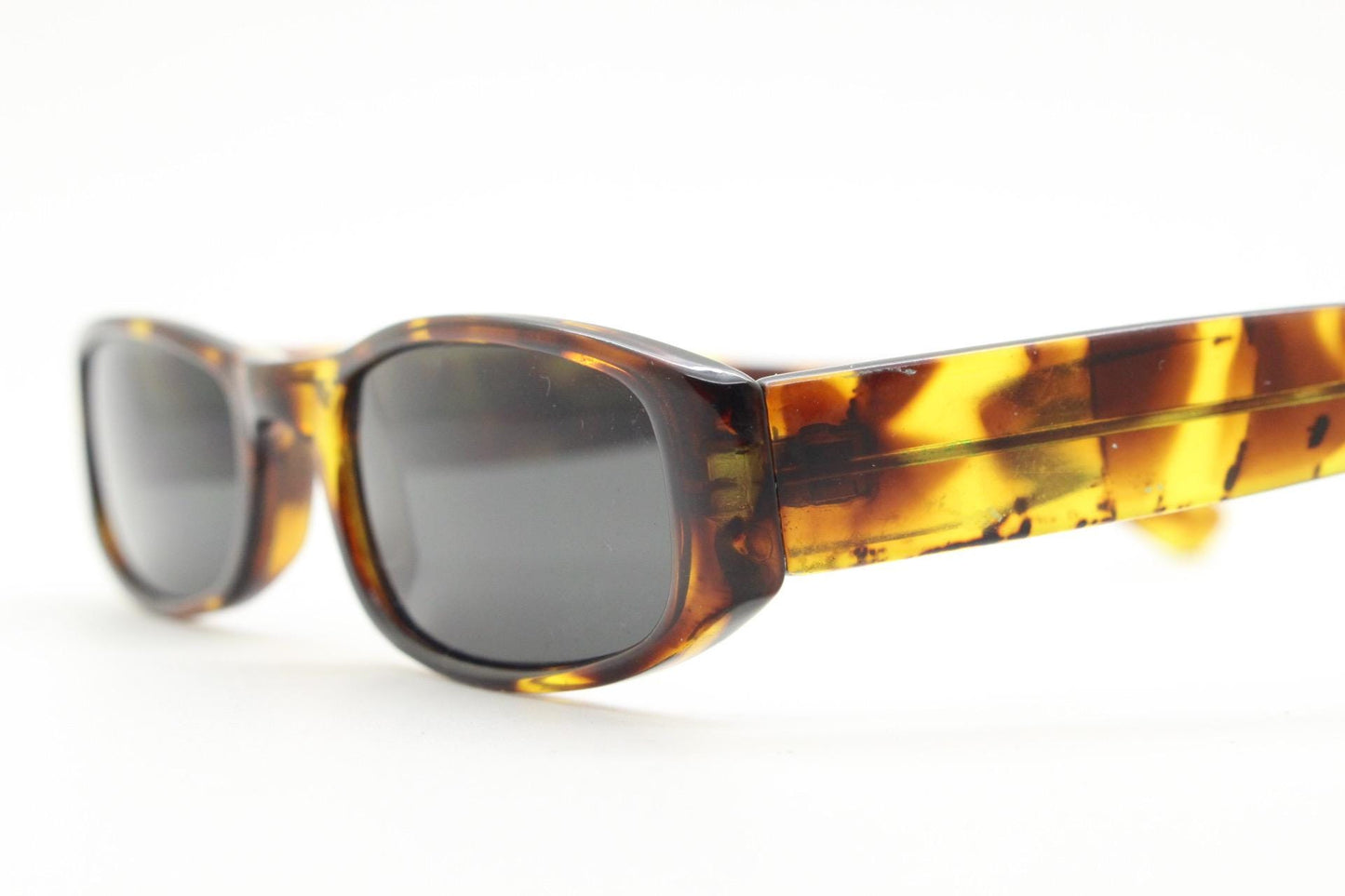 90s vintage rectangular sunglasses. Authentic and sharp low profile vibrant tortoise frame with full height arms. BNWT Unused NOS