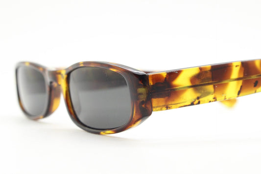 90s vintage rectangular sunglasses. Authentic and sharp low profile vibrant tortoise frame with full height arms. BNWT Unused NOS