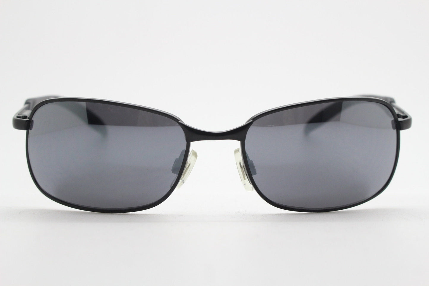 Y2K vintage wraparound sunglasses. Black satin matt finish on rectangular frame with slight mirror glaze lenses. 2000's. 90s. Unused NOS