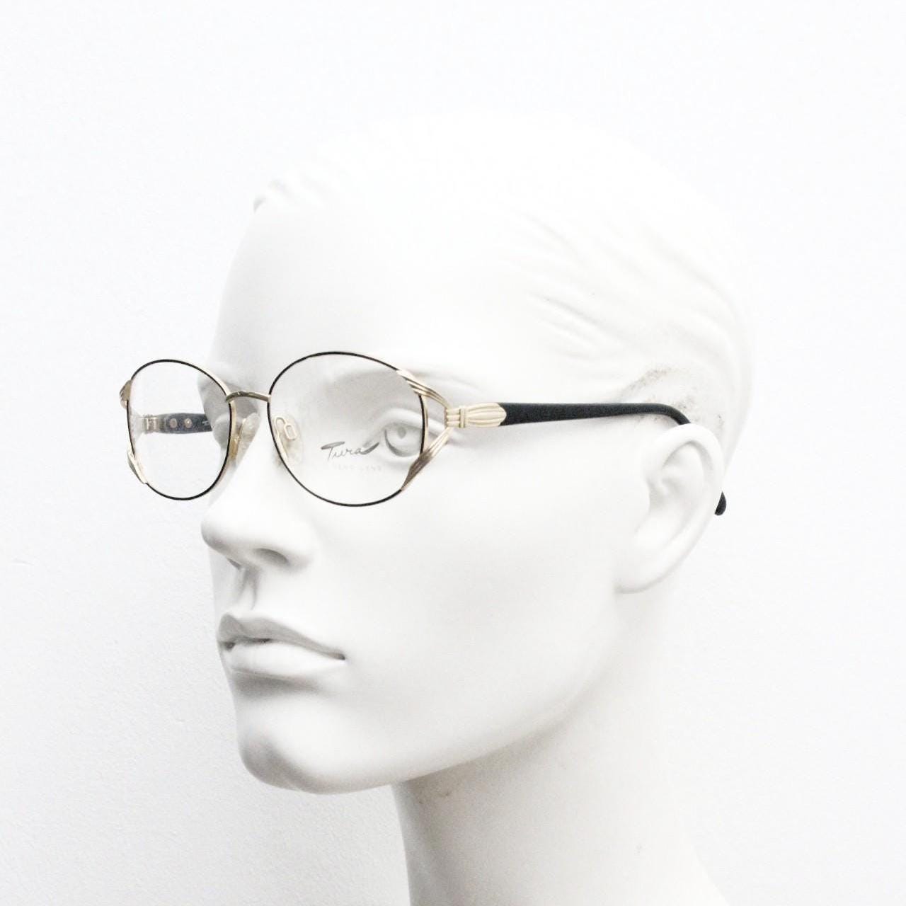 Tura 80s vintage oval eye glasses made in Italy. Womens black and gold optical frame with Y forked temples. Prescription RX. Unused NOS