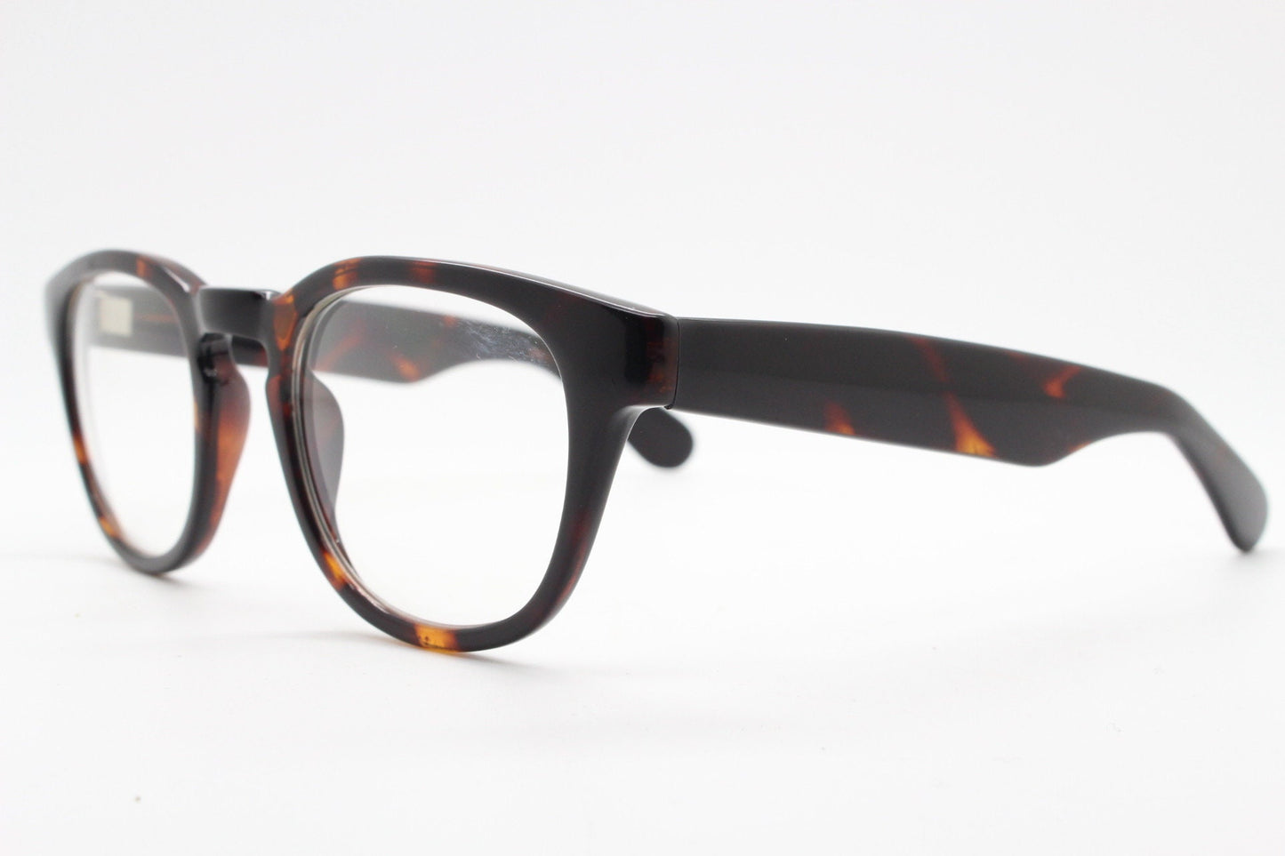 80s vintage modified wayfarer style glasses. Tortoise optical frames with keyhole bridge and clear lenses. 40s, 50s style NOS eyeglasses