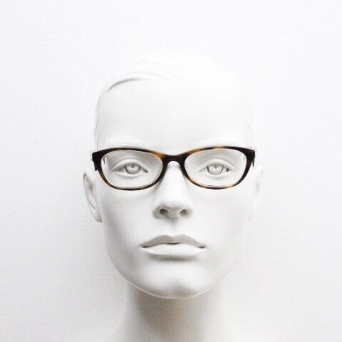 Calvin Klein Jeans modified cat eye glasses model CKJ918. Tortoise gloss low profile acetate optical frames. Prescription eyeglasses. RX