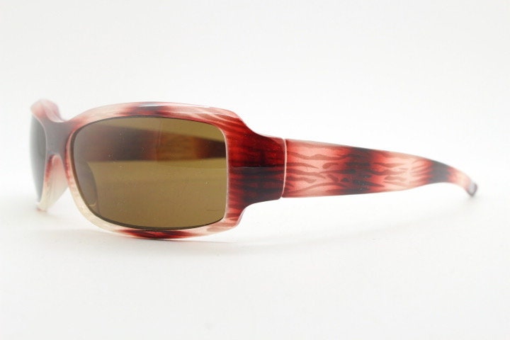 Vintage rectangular shield sunglasses. Transparent abstract red tiger print low profile visor style wrap around frame. Y2K NOS. 2000s