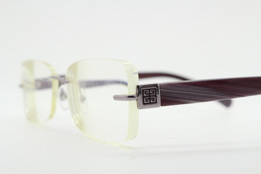 Givenchy rectangular frameless eye glasses made in Italy. Minimal optical frame with marbled brown arms. Prescription RX spectacles. Vintage