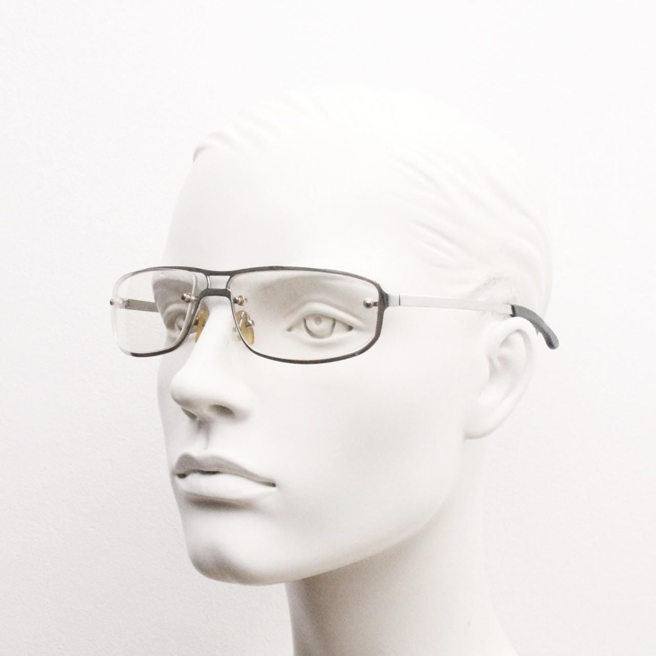 Y2K vintage rectangular aviator sunglasses. Aerodynamic racing style chrome frame  with slight mirror glazed clear lens. 2000's bug eye