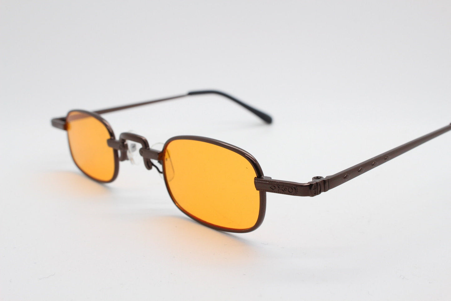 90s vintage small rectangular sunglasses. Imposing minimal bronze brown metal victorian style frame with orange lenses. Steampunk. BNWT