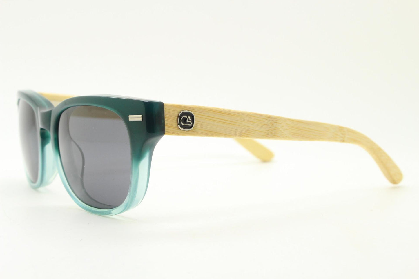 Calisons ryder modified wayfarer design sunglasses. Thickened blue acetate front with natural real wooden arms. Unused NOS