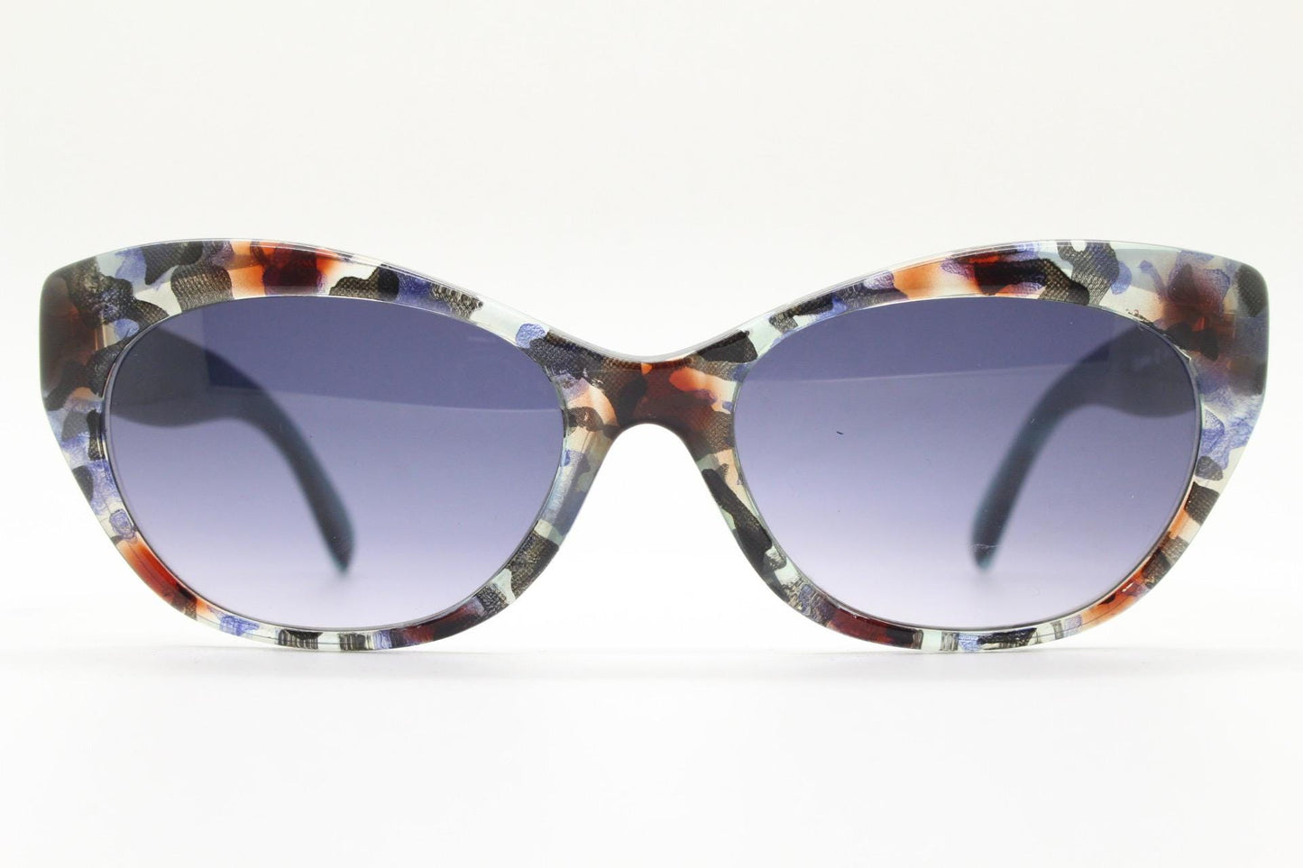 Piave 80s vintage colourful cat eye sunglasses made in Italy. Transparent cateye with abstract marbled patterns and gradient lenses. NOS