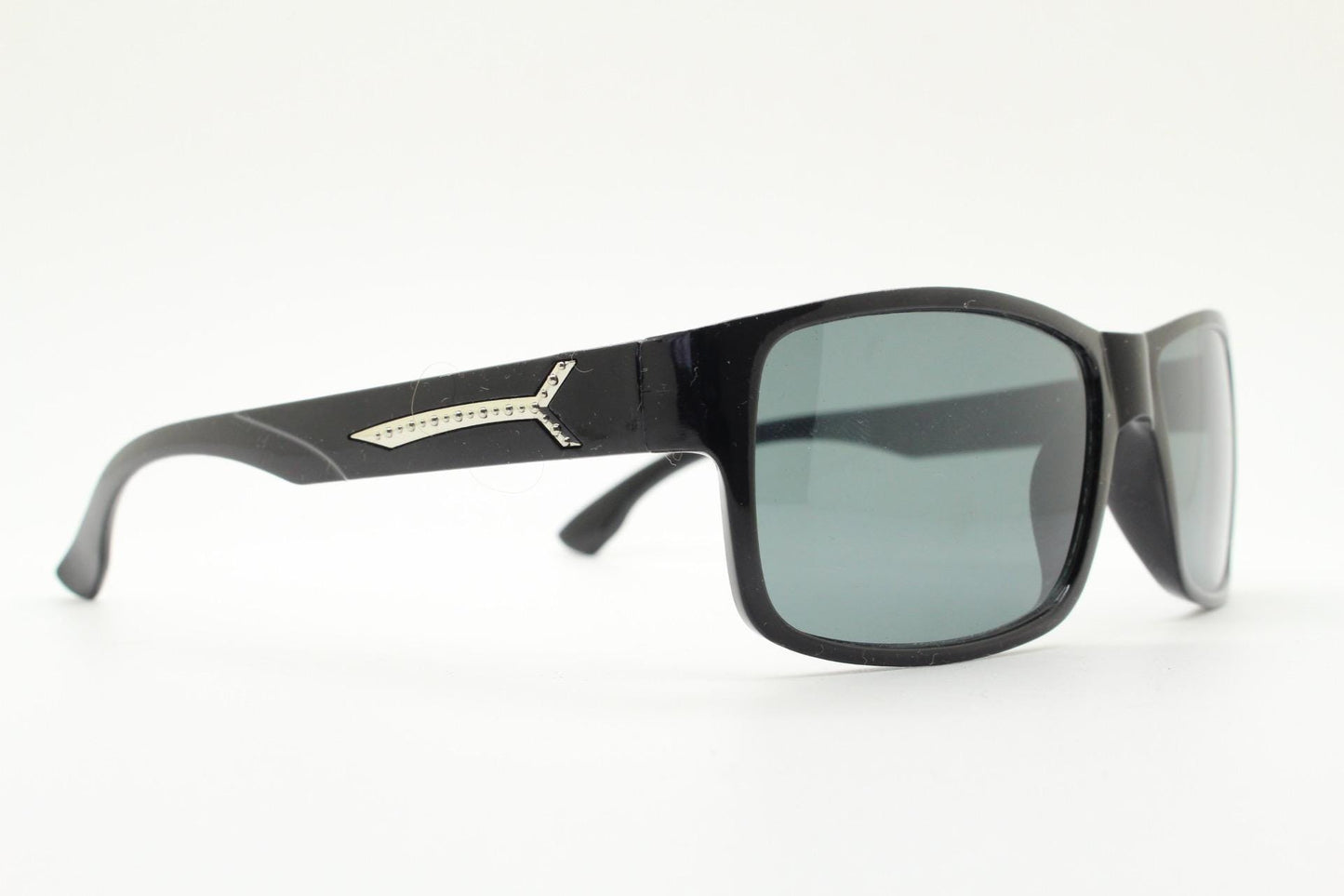 Y2K vintage sharp rectangular sunglasses. Large curved black gloss frame with dark green lenses and silver arrow arm crests. NOS