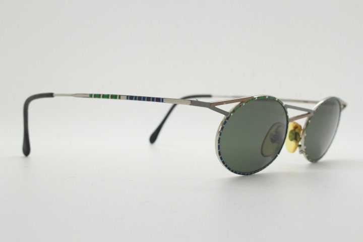 Taxi 90s vintage oval sunglasses. Unique innovative abstract design with extraordinary multi colour print. Casanova