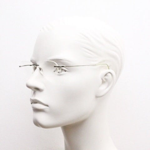 Silhouette rectangular frameless eye glasses made in Austria. Minimal lightweight optical frame with silver trim. Prescription RX