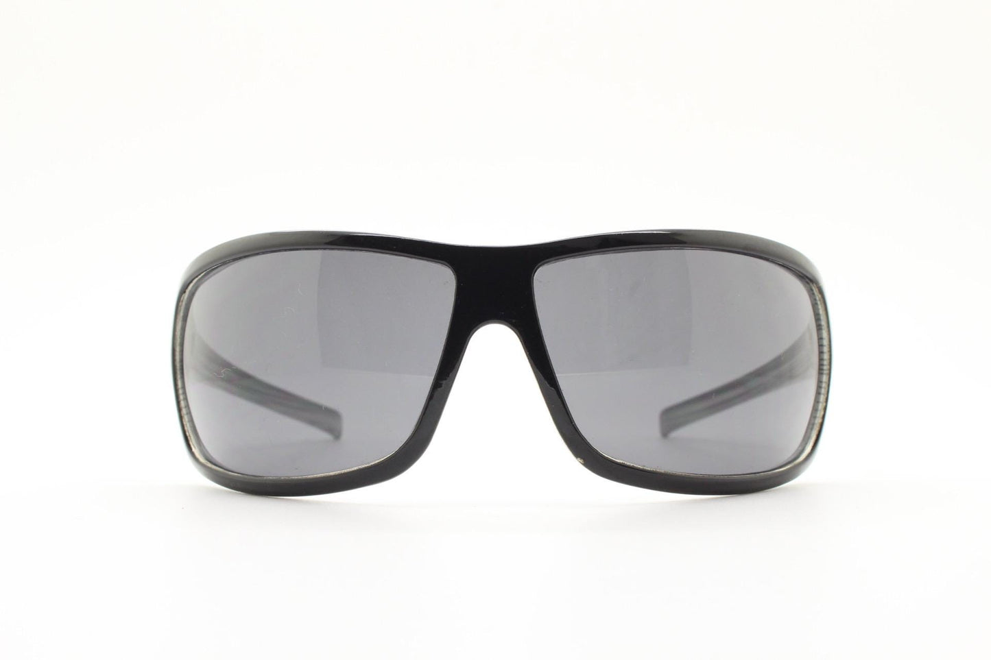 Y2k vintage wrap around large square sunglasses. Curved black shield frame with tasteful striped interior. 1960s bug eye design. 2000's NOS