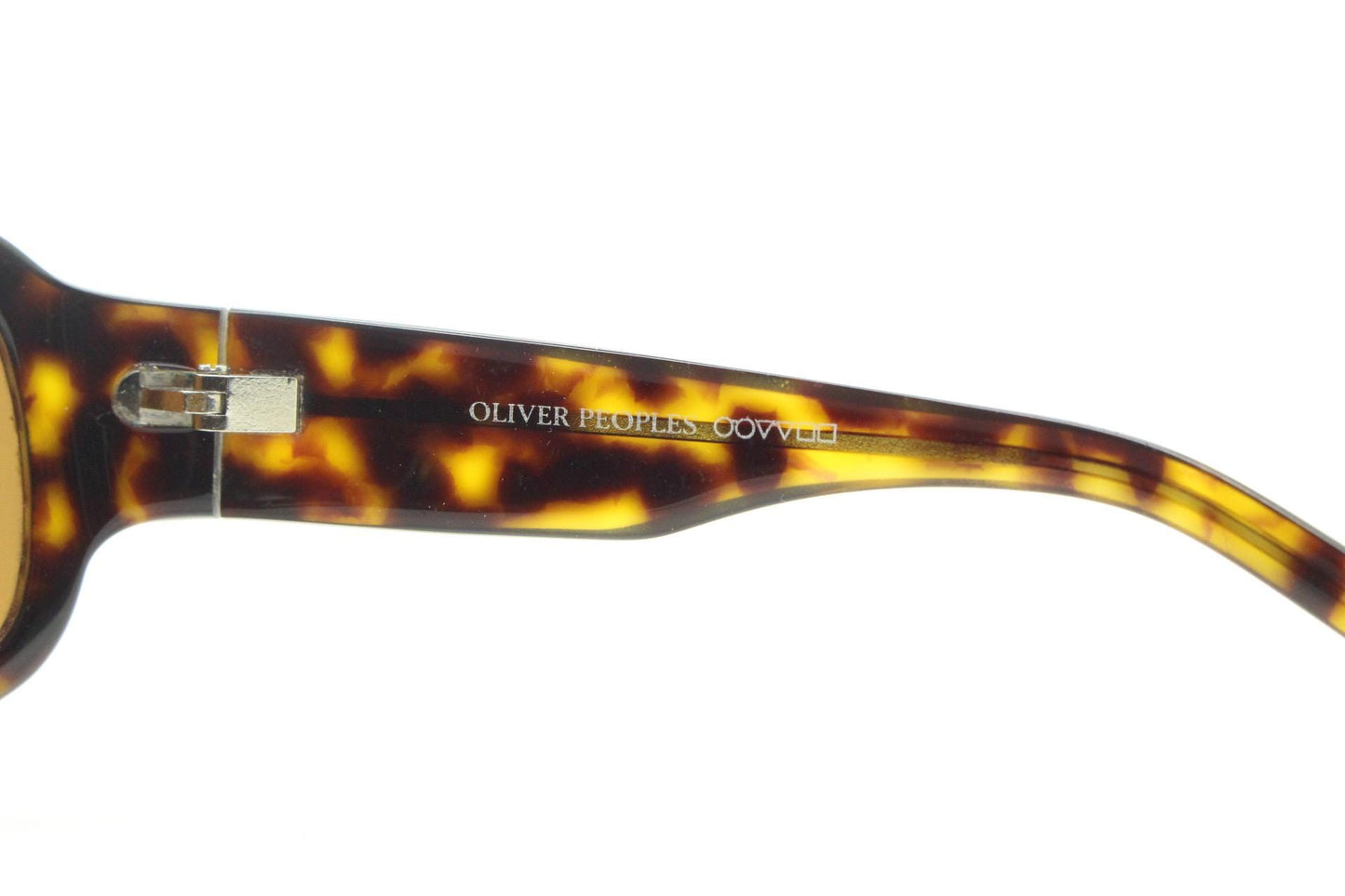 Oliver Peoples vintage Y2K wrap around sunglasses model Impala made in Japan. Curved bug eye in mottled brown tortoise acetate