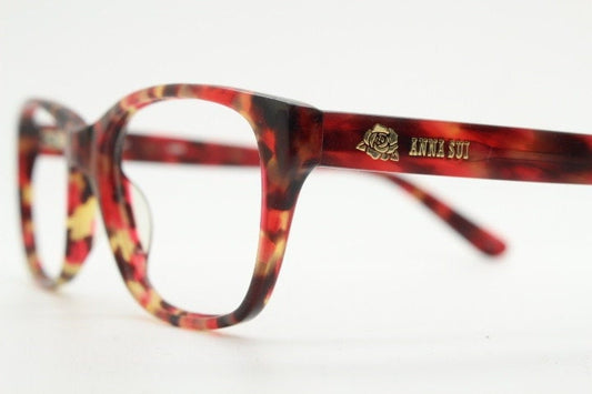 Anna Sui modified wayfarer design eye glasses. Superb marbled acetate optical frames with red tones. Prescription RX vintage eyeglasses