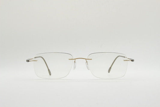 Silhouette rectangular frameless eye glasses model 7719 made in Austria. Minimal lightweight titanium optical frame. Prescription RX