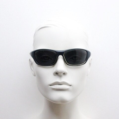 Y2K vintage sport shield sunglasses. All matt black wraparound aerodynamic visor with light green outline. 2000's. 90s. Unused NOS