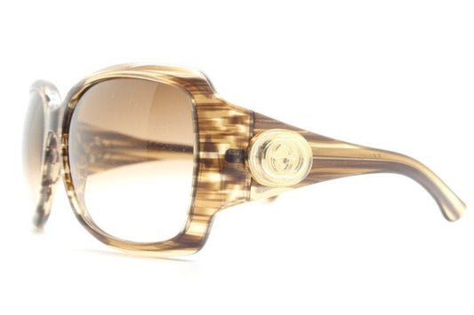 Gucci Y2K vintage oversized square sunglasses made in Italy. Transparent mottled brown frame with glitter sparkles and big stand out logo