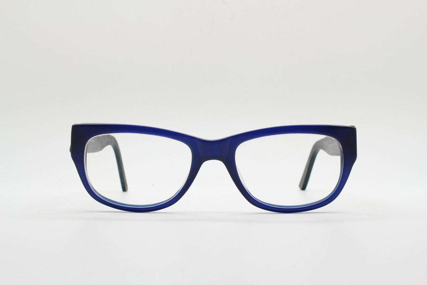 Chunky frame modified cat eye glasses. Superior quality optical eyeglasses. Deep blue front with wood look arms. Prescription RX Spectacles