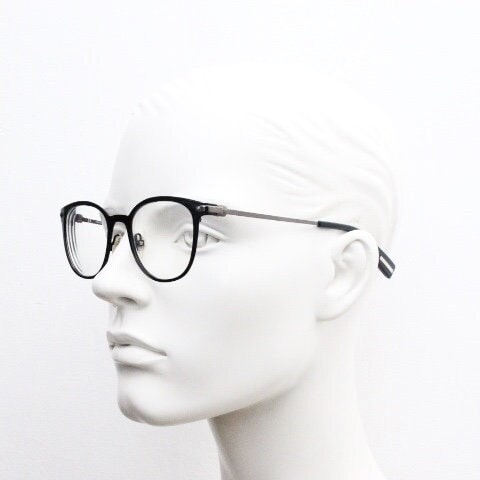 Trussardi modified cat eye glasses model VTR023. Womens flat black and gunmetal grey optical frame. Prescription. Vintage spectacles