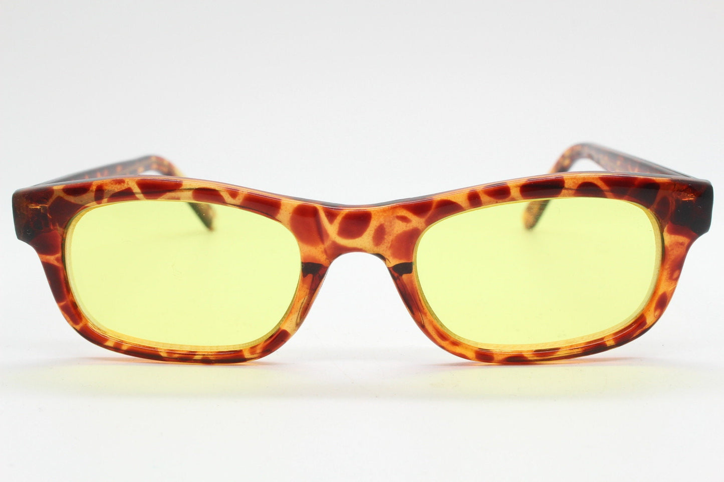 80s vintage rectangular sunglasses. Low profile 60s design tortoise frame with psychedelic light tone canary yellow lenses. BNWT Unused NOS