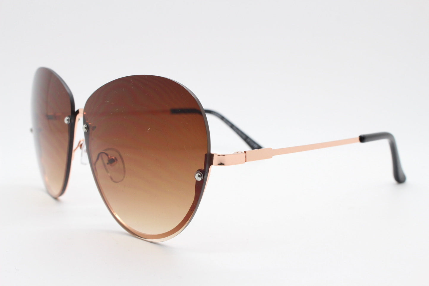 Y2K vintage large rimless sunglasses. Women's 70s style half frame design with graduating brown lenses and gold arms. 2000s BNWT