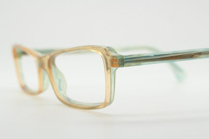 Alain Mikli rectangular eye glasses hand made in France. Low profile slim peach and blue transparent acetate optical frame. Prescription RX.