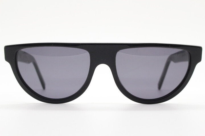 Retrosuperfuture thick flat top cat eye sunglasses hand made in Italy. All black gloss acetate frame. Vintage