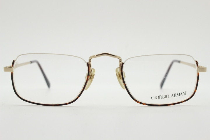 Giorgio Armani rectangular eye glasses made in Italy. Half frame underwire with metallic tortoise enamel. Prescription optical eyeglasses RX