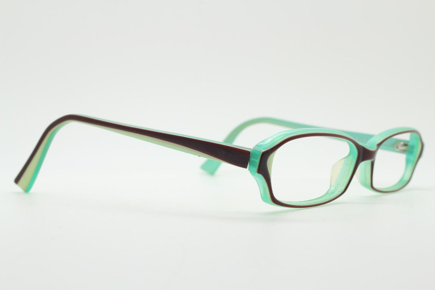 Francois Pinton Paris rectangular cat eye glasses made in Italy. Womens vibrant green acetate optical frames with brown front. Vintage