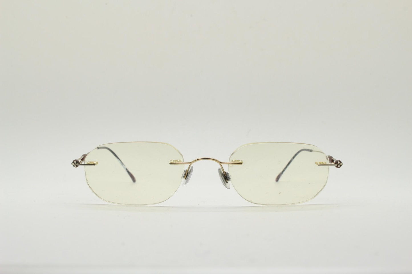 Silhouette vintage angular oval frameless eye glasses made in Austria. Minimal lightweight titanium optical frame. Prescription spectacles