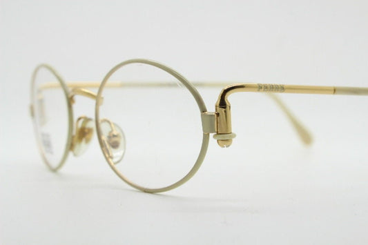 Gianfranco Ferre 90s vintage oval eye glasses made in Italy. White and gold metal tech design optical frame. Prescription RX spectacles. NOS