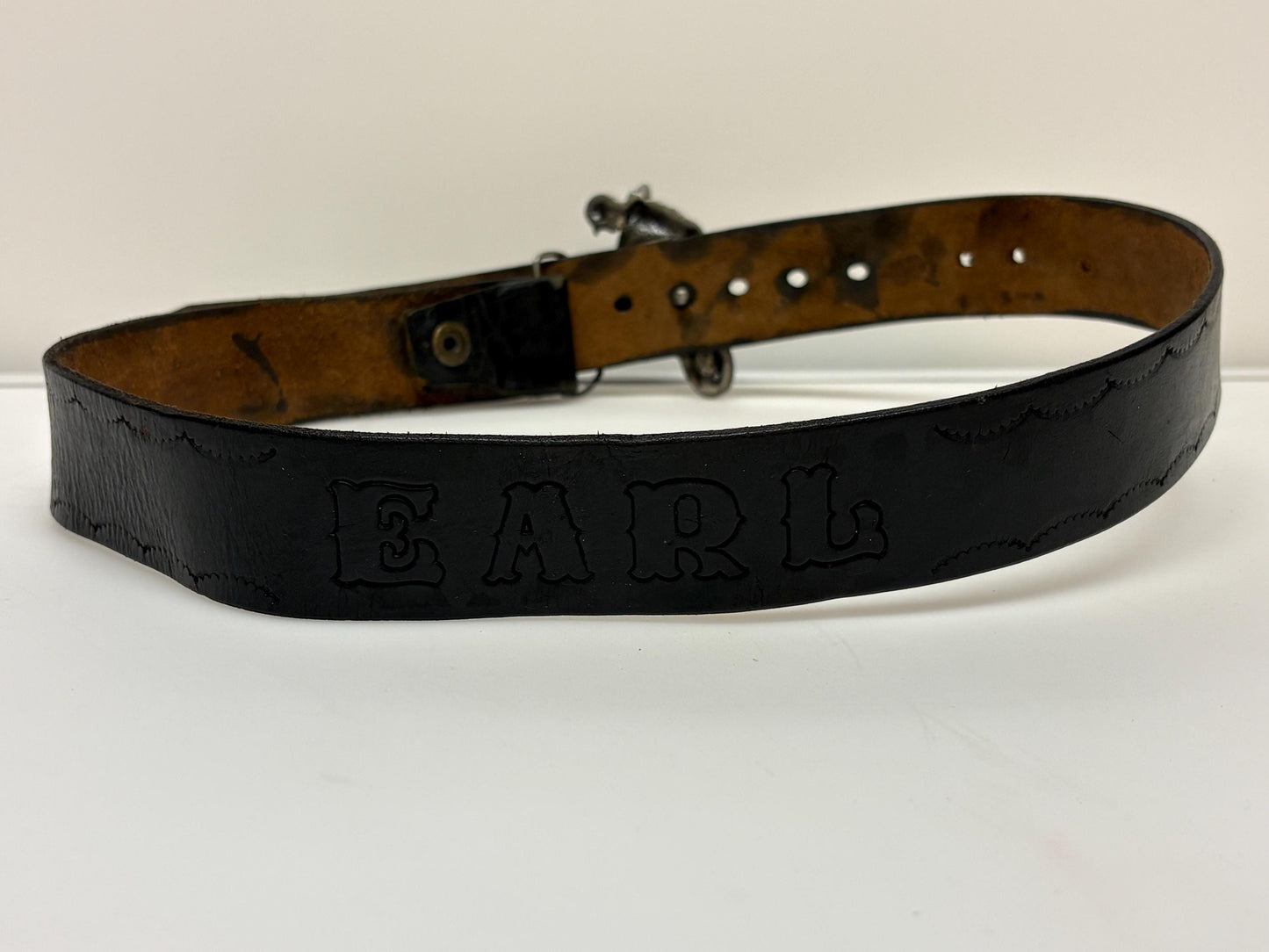 70s vintage Bergamot brass works 3D motorbike rider buckle on black genuine leather textured and embossed changeable belt. Moto X scrambler