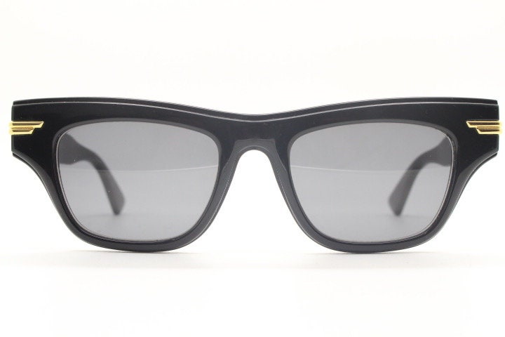 Bottega Veneta thick flat top cat eye sunglasses made in Japan. Black gloss acetate frame with sharp cropped sides. Womens cateye. BNWOT