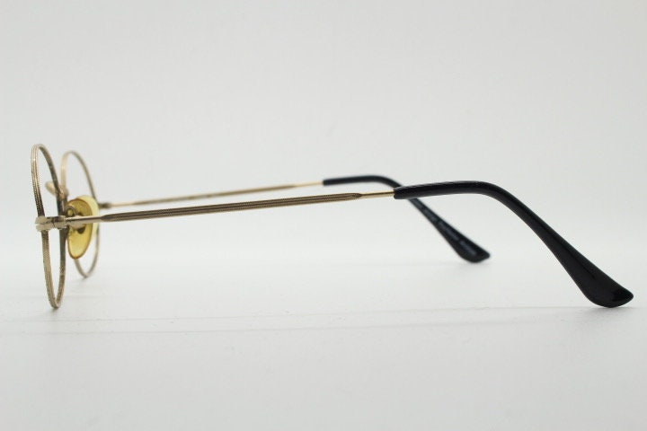 Giorgio Armani 90s vintage oval eye glasses made in Italy. 30s design gold optical frames in a satin finish. Prescription RX