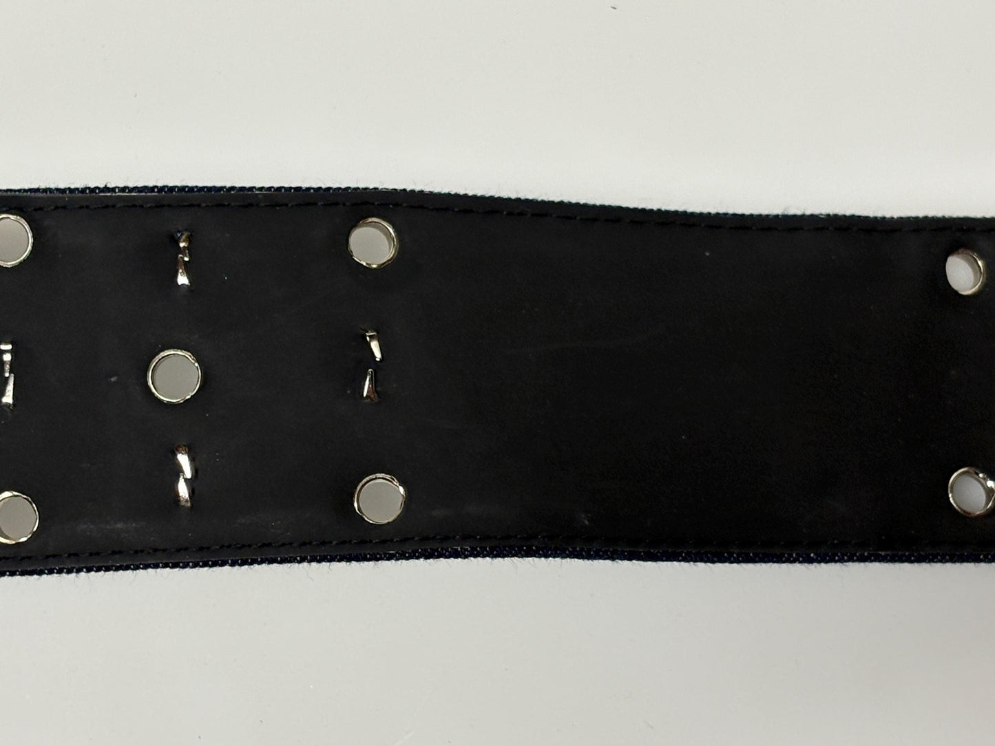 Y2k vintage tall blue denim belt with metal buckle and 3 rows of cool conical star studs and loops. Statement feature piece. 2000s NOS